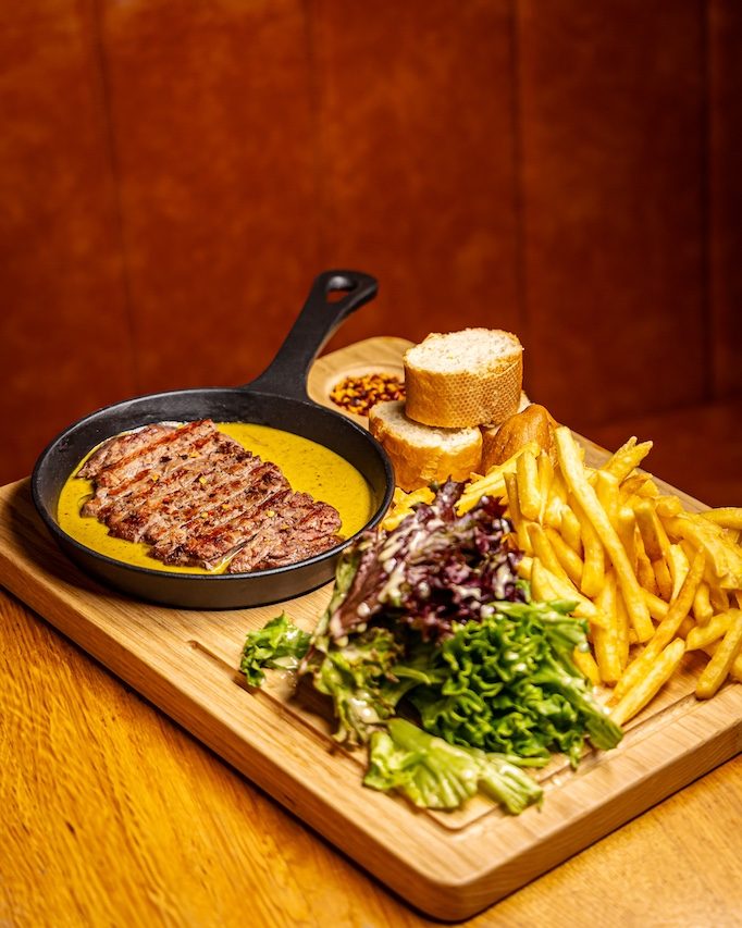 Beef filet sliced in our signature butter sauce